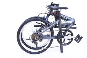 Folded position of a gray folding bicycle.