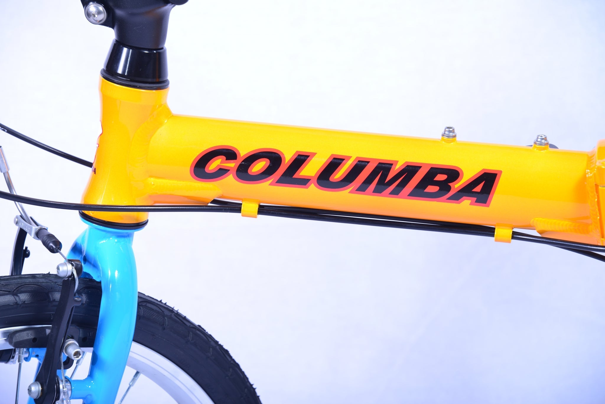 Tube of an orange and blue folding bicycle with a logo titled "Columba."