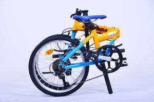 View of a bike in folded position of an orange and blue folding bike.