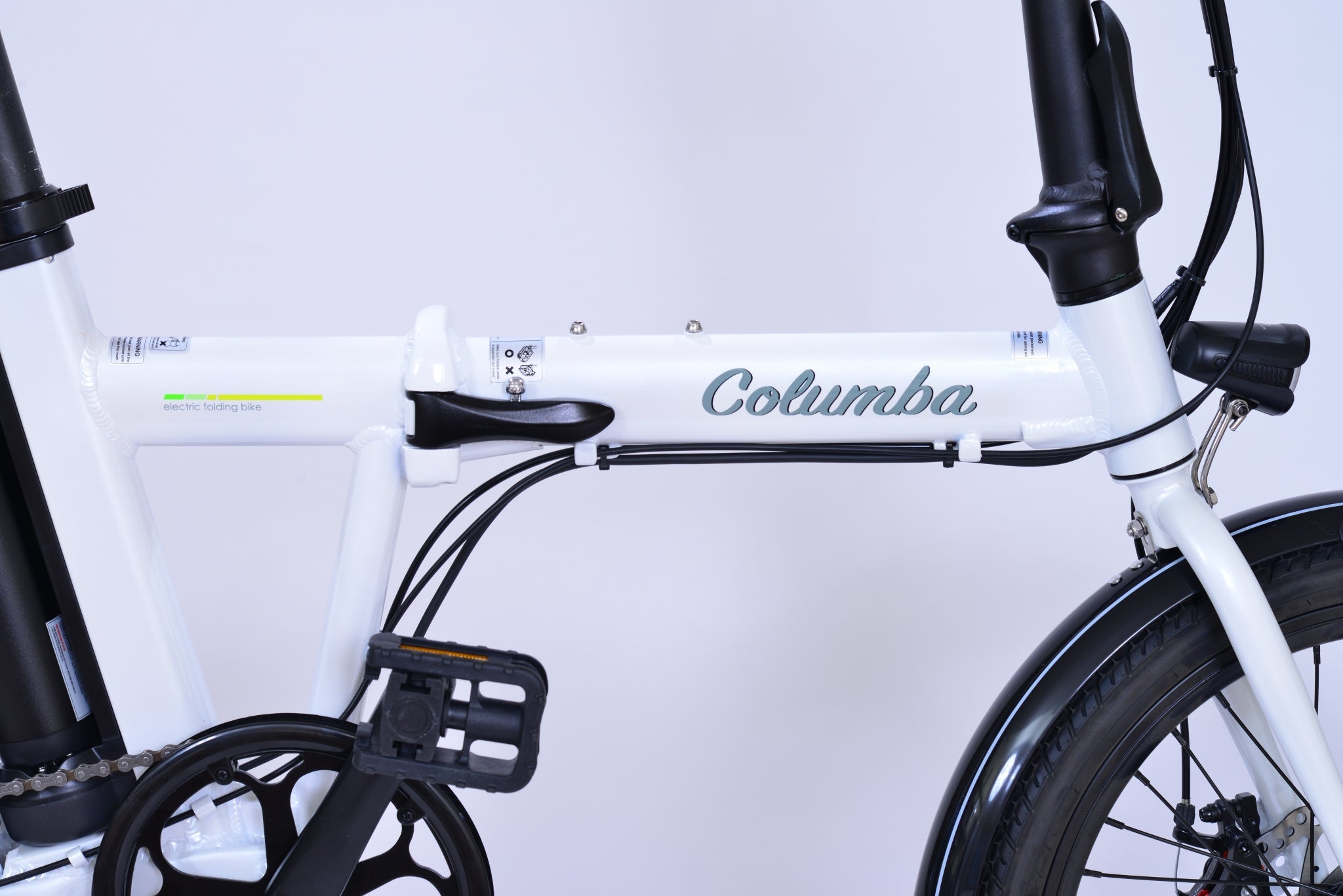 Side view of a white electric folding bicycle.