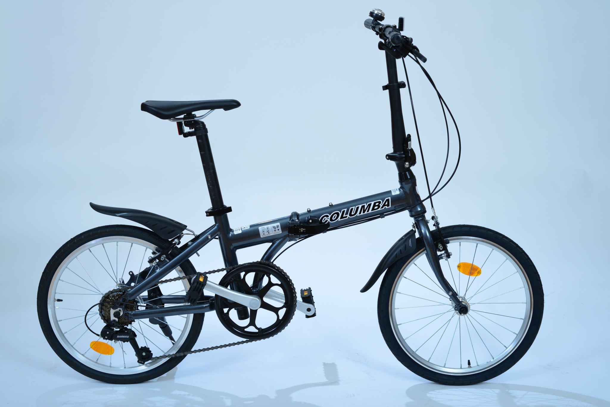 Full view of a dark gray folding bicycle.