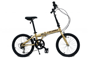 Full view of a gold folding bicycle.