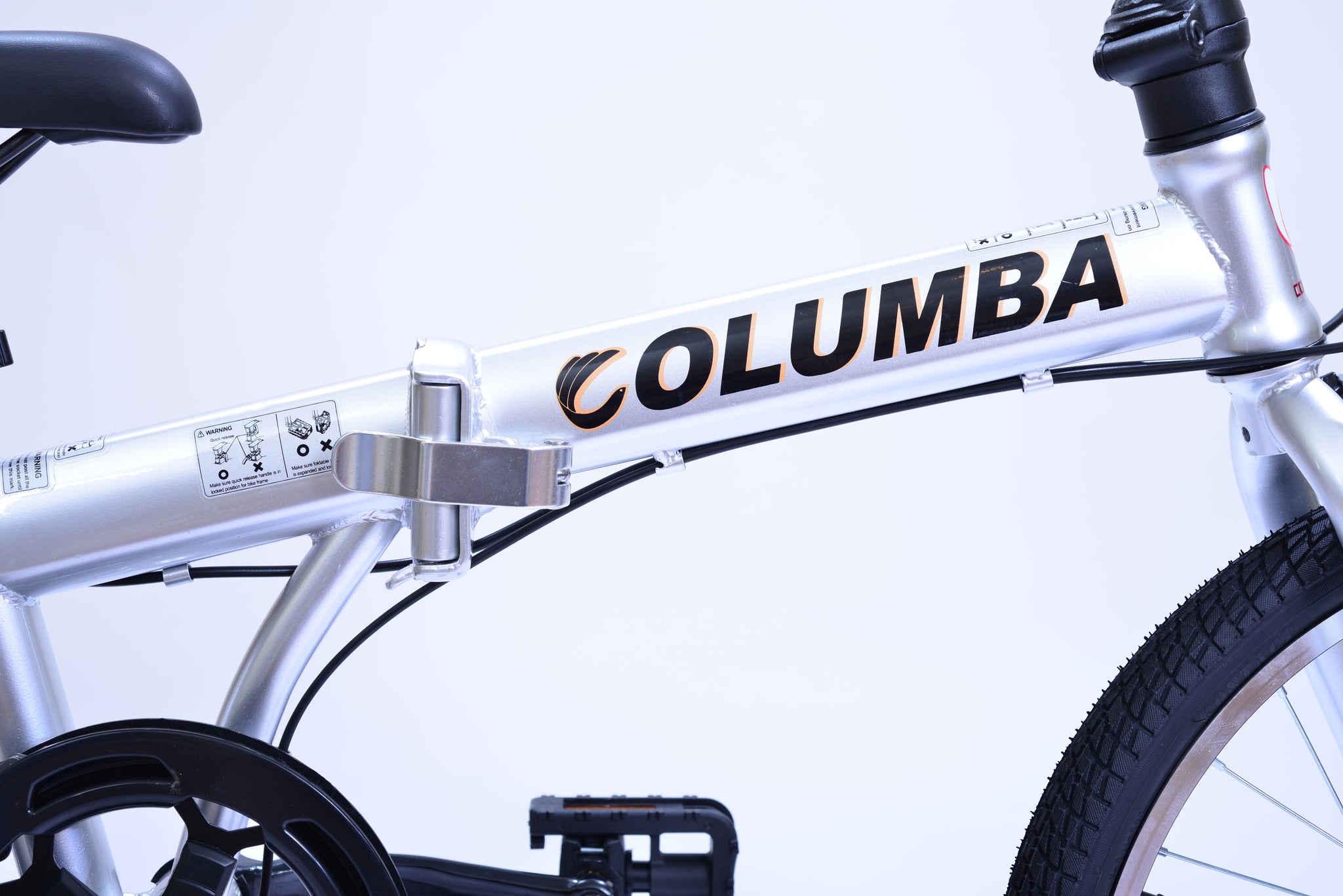 Silver bike tube of a folding bicycle with a wordmark logo titled "Columba."