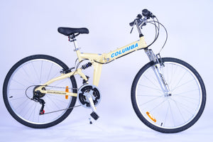 Full view of a cream colored folding bicycle.