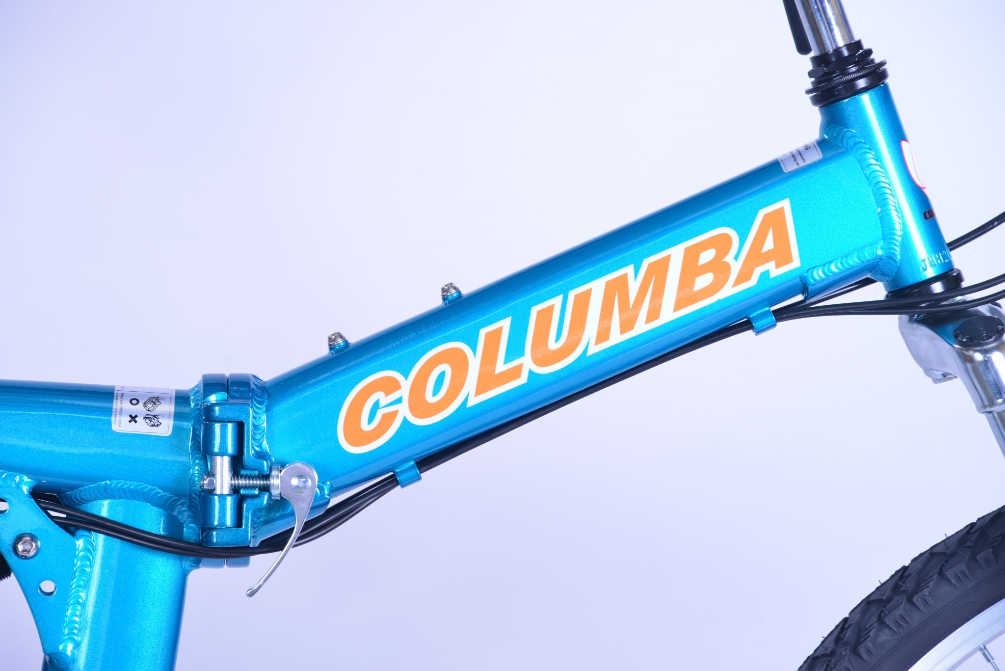 The tube of a blue folding bicycle with a white and orange logo that reads "Columba."