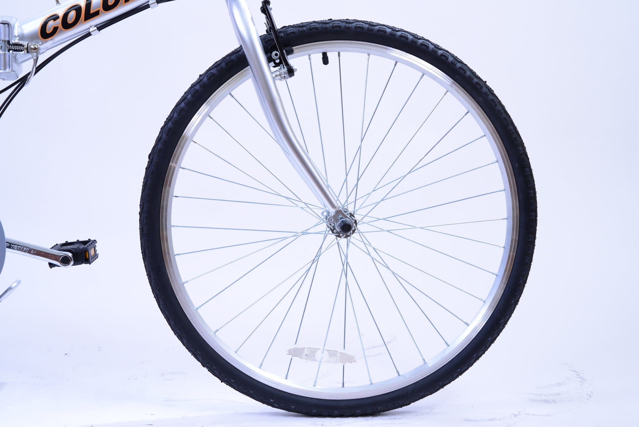 Bike wheel with silver rims.